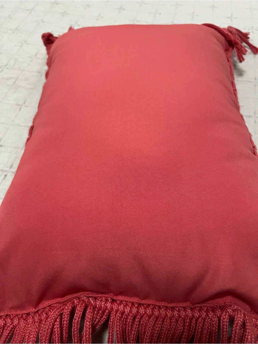 Textured macrame coral pillow
